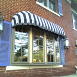 Bay window - exterior, blue shutters