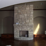 Interior renovation, stone fireplace, under construction