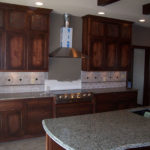 Kitchen remodel, brick backsplash, marble countertops, in progress
