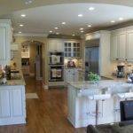 Remodeled Kitchen - marble countertops and white cabinets