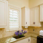 Custom white cabinets and shutters