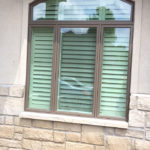 Large arched window - shutters, exterior