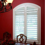 Arched window - white shutters